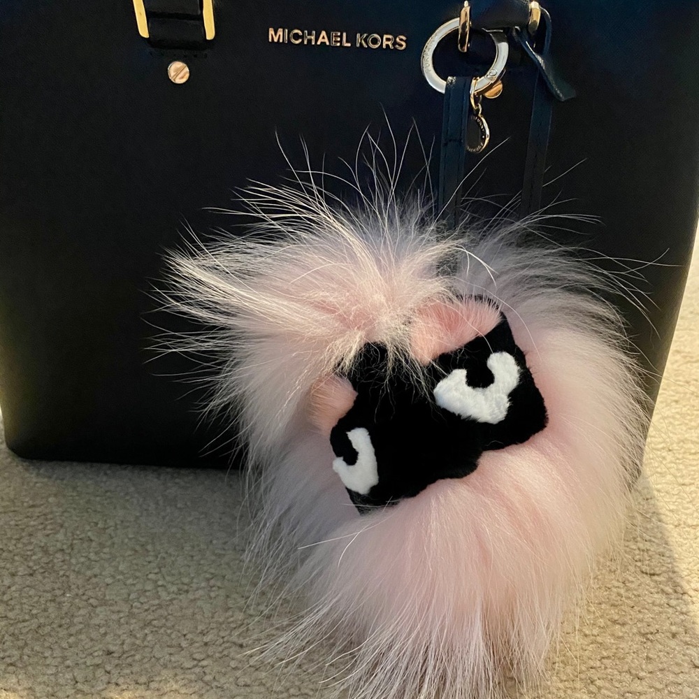 Monster real fur purse pom pom.